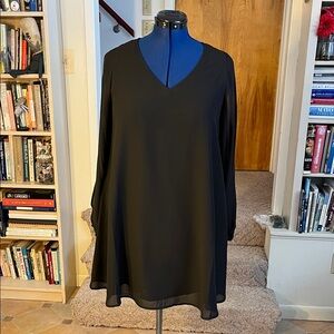 Sassy Little Black Dress. Sheer split sleeves Size Large